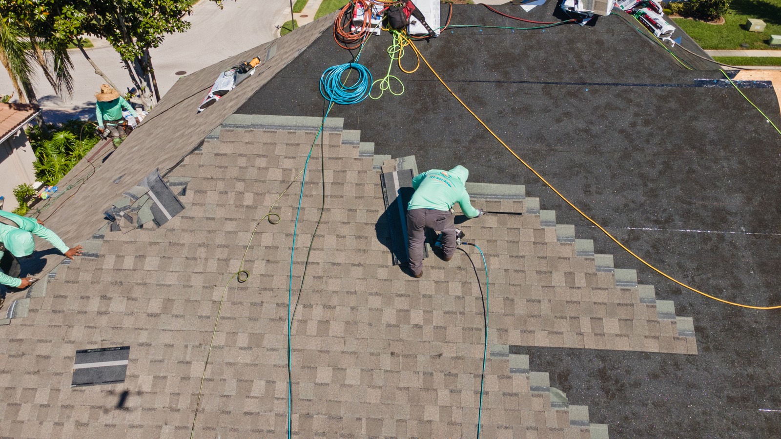 Aerial view of a Tampa Bay neighbourhood with several roofs at different ages
